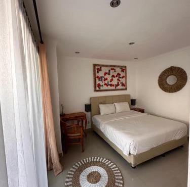 Bedroom with pool view Villa Uma Candi