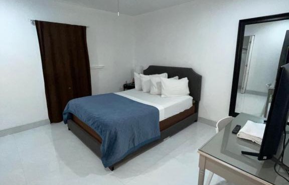 bedroom with sharing bathroom