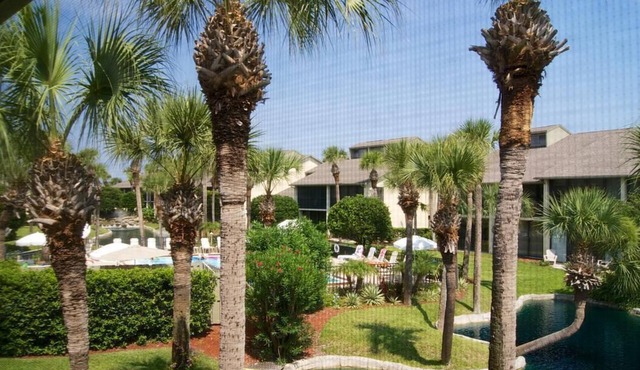 Begin your mornings with coffee on covered lanai overlooking both the lagoon and pool.