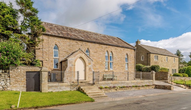 Behind the beautiful arched door way is the luxurious interior of Church Manor.