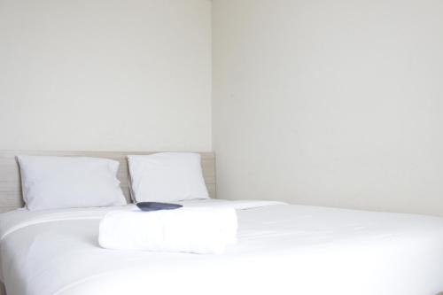 Best Location 2BR Tamansari La Grande Apartment By Travelio