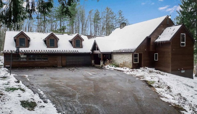 Best of both worlds; chalet located on a private lot in the pines and only 1 miles from the village!