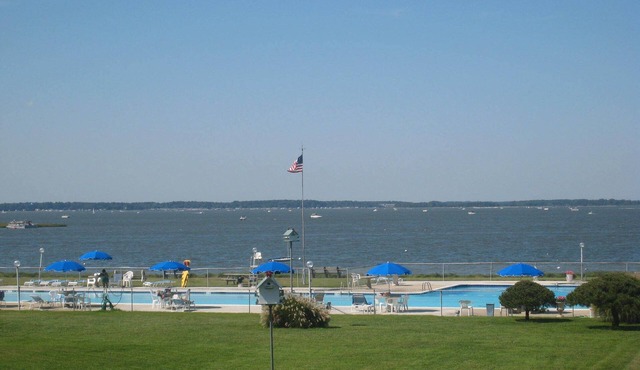 Bethany Bayfront condo directly on the Bay large pool, open area, great Sunsets