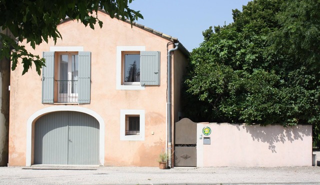 Between Avignon and Nîmes, in a village on the banks of the Rhône .