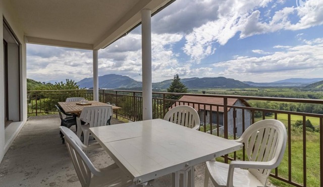 BETWEEN LAKE AND MOUNTAIN - A