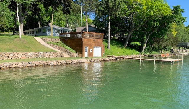 Big Cedar Lake, 125 feet of sandy frontage, beautiful shore, sunsets, spacious