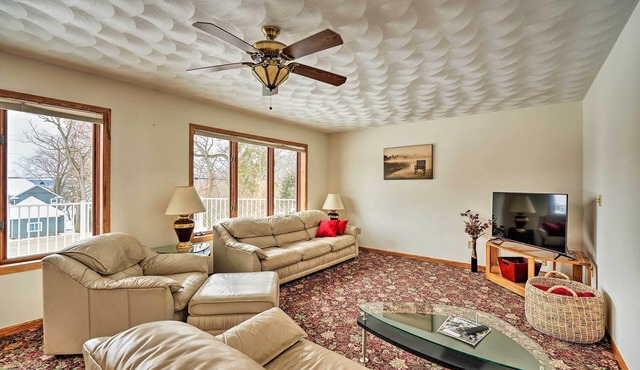 Big Green Getaway w/ Lake Views & Wraparound Deck!