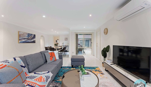 Big Group Stay: 4BR Retreat near Trains & Parks