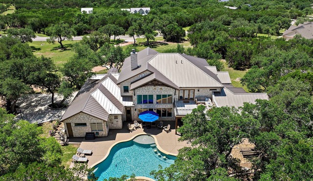 Big Red Chicken Estate | Luxe Pool, Spa, Media Room & Space for the Whole Crew