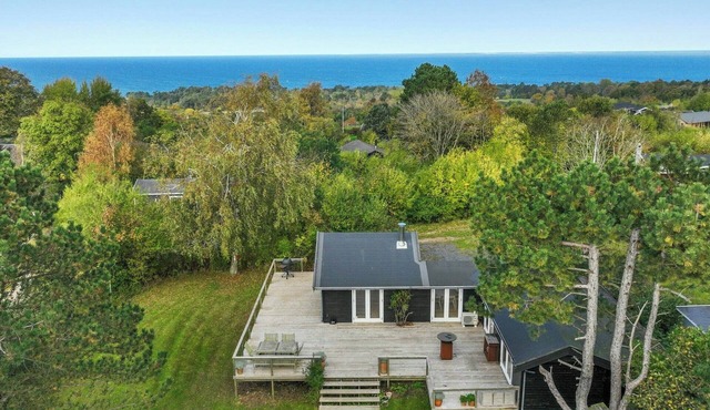Black wooden house with panoramic views