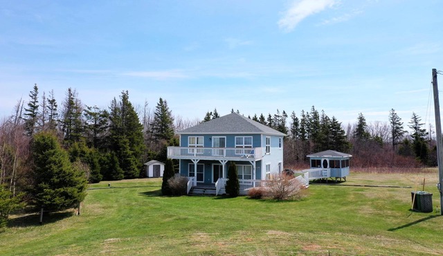 Blooming Point Beach House – Stunning Views, Beach Access, and Coastal Charm