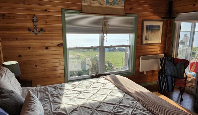 Blooming Point home on Tracadie Bay with sunset views of the National Park Dunes