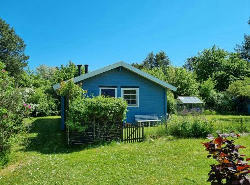 Blue Cottage On Idyllic Askø