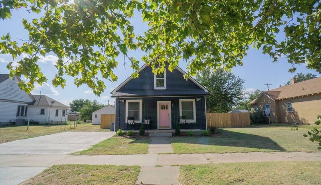 Blue house on 5th! Arcade room, fire pit, privacy fenced yard, and more!