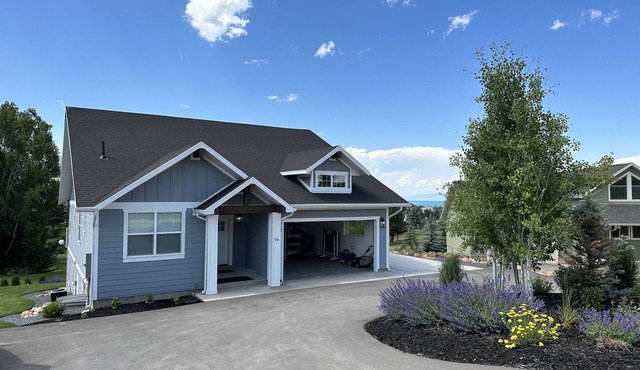Blue Lake Retreat - fully-landscaped home sits on 2nd tee of Bear Lake G.C.