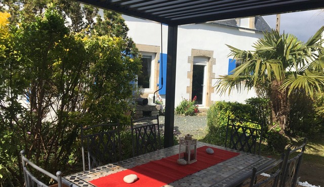 Blue longere by the sea