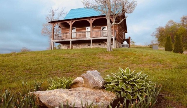 Blue Willow Cabin, high up on the hill with180 degree views.