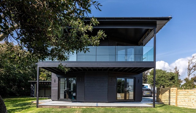 Bluebells: Eco-Friendly 4-Bed Home with Sea Views in Llanfaelog | Managed by Anglesey Holiday Lettin