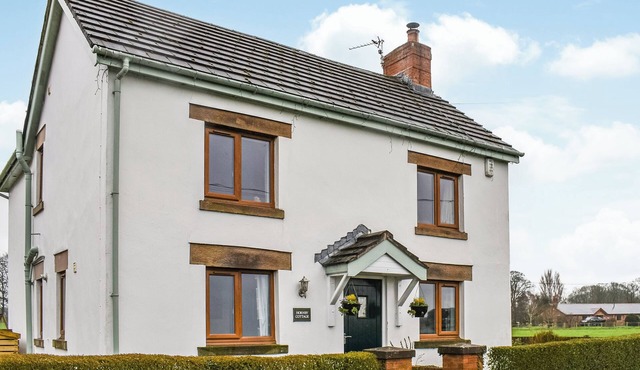 Boasting a private garden, stunning views and ample parking.