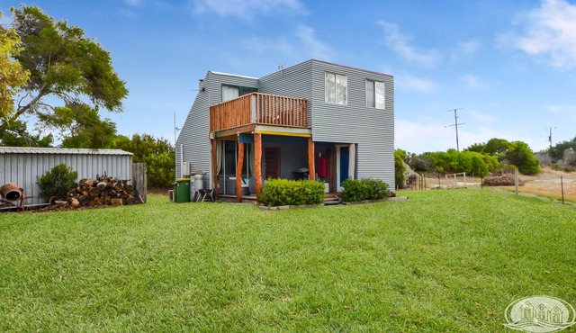 Boat friendly, affordable beach shack accommodation on Dutton Way coastline.