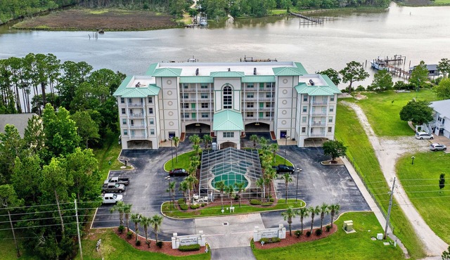 BOAT SLIP! Stay Monthly Oyster Bay Retreat for 6! Waterfront Condo w/ Resort Ame