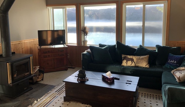 Boathouse Cottage on the water, access to snowmobile trails and ice fishing.