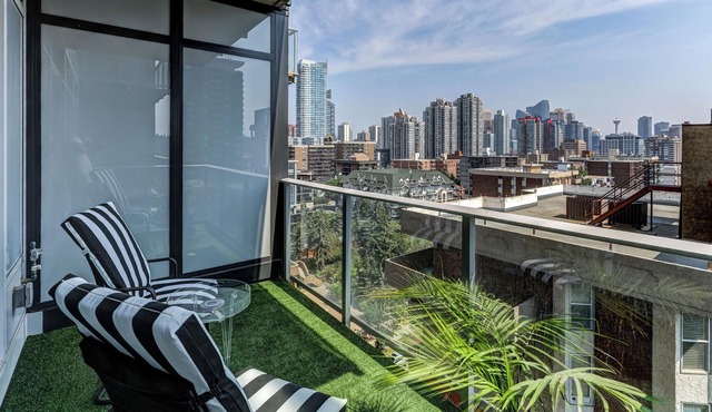 Boutique Downtown Retreat with Skyline Views, Fireplace & Heated Parking