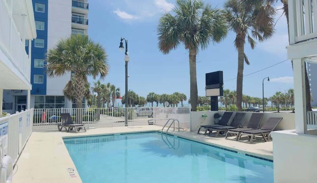 Boutique on the beach, Studio #102 + Pool
