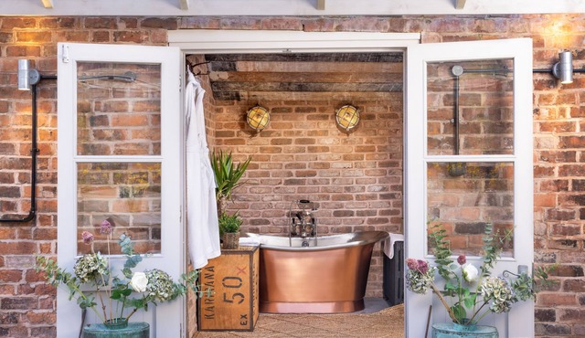 Boutique, three storey Georgian Town House, ground floor apartment with garden