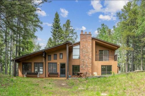 Bragg Creek Vacation Estate with hot tub, sauna, pool table, karaoke, private pond and forest trails