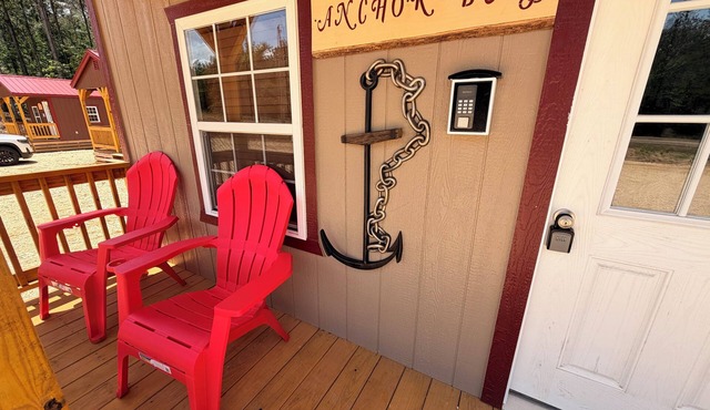 BRAND NEW! 1 bedroom cabin with two beds and a large couch. Near pickwick lake