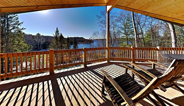 Brand New 5 bedroom Lacourte Orellies lakefront home with covered deck and amazing lake views.