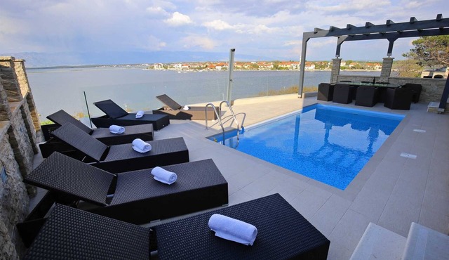 Brand new amazing sea front villa with pool for up to 10 people