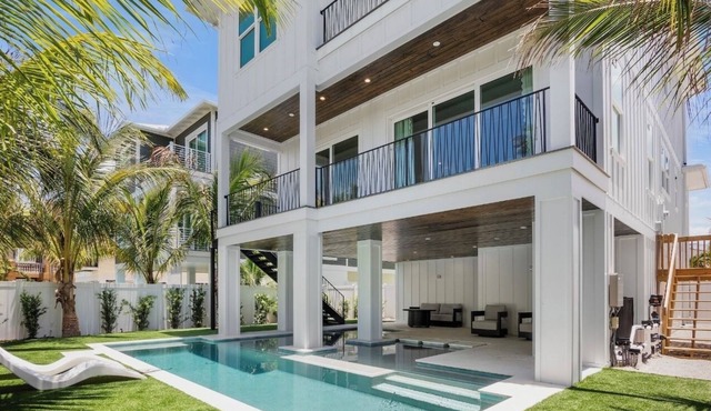 Brand new Beautiful Beach House! Heated pool and spa! Close to beach!