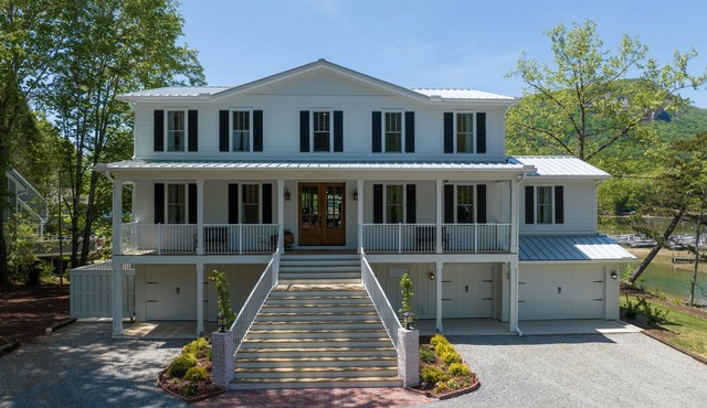 Brand New LAKE FRONT-6 BR 7 BA home with direct views of Rumbling Bald