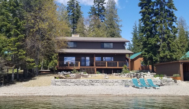 Brand New Listing. Remodeled lake home, private beach and dock