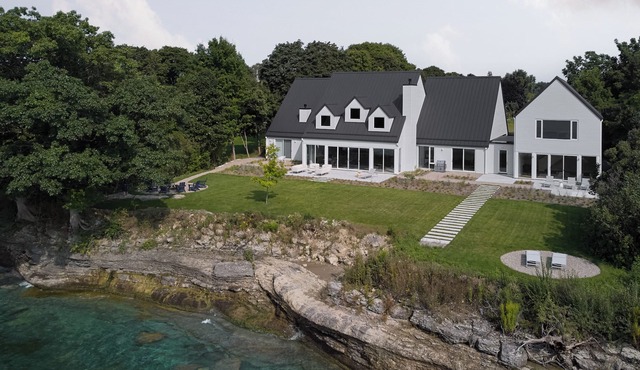 Brand new luxury custom built lake house with 130 ft frontage on Lake Ontario