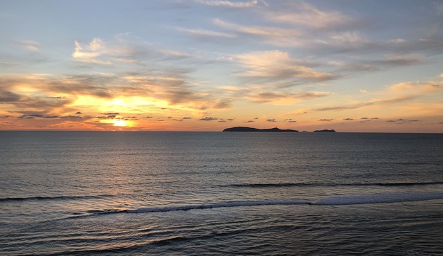 Brand new luxury condo right on the beach with amazing sunset views