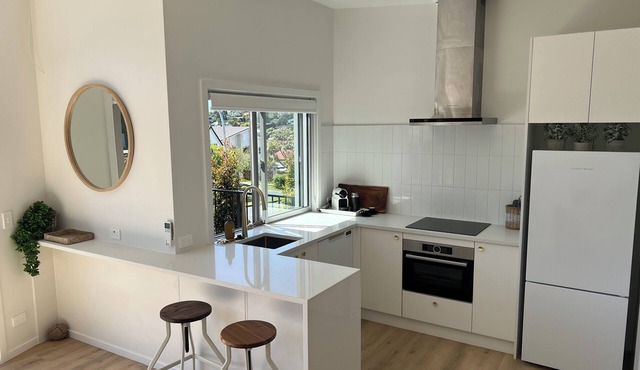 Brand new, luxury stand alone unit by the beach!