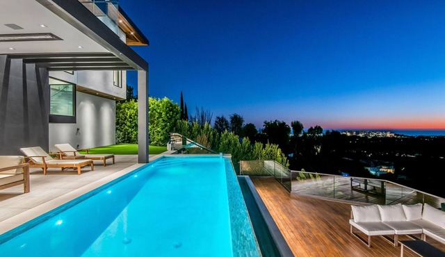 Brand new modern masterpiece in Bel Air with exceptional ocean and city views!