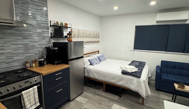 Brand new modern studio with private romantic garden in an upscale neighborhood