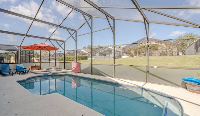 Brand new modern themed 4 bed home with large pool/spa, pool table, in gated community. Disney 10 mi