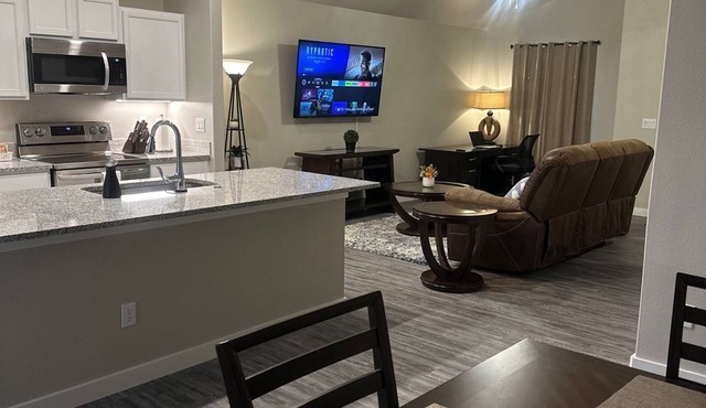 Brand new quiet cozy furnished home in odessa Midland with TV in each room.