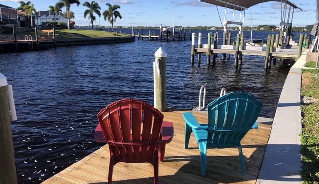 Breath taking canal, pool home with golf access. 15 minutes from beaches.