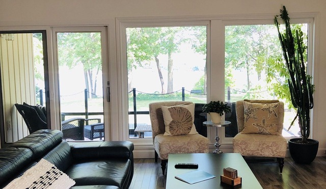 Breathtaking Views of the Niagara River from a Private Contemporary Home in NOTL