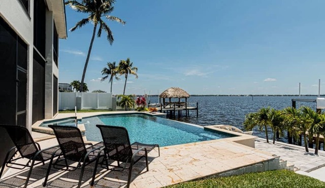 Breathtaking 6BD Riverfront Mansion w Pool