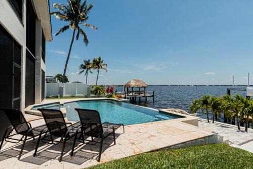 Breathtaking 6BD Riverfront Mansion w Pool