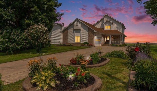 BREATHTAKING LAKEFRONT HOME WITH PANORAMIC VIEWS OF LAKE ERIE! ALL GLASS SUNROOM