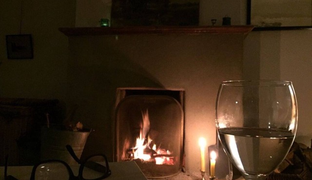 Breathtaking location - simple 1930's home with log fires & amazing sunsets