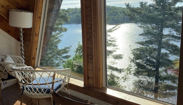 Breathtaking views from rustic cottage atop the Edge of Kennisis Lakes!